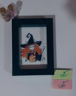 نقاشی( دختر با سبک تیم برتون)درون قاب عکس