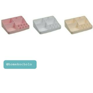 استند لوازم آرایشے پلاستیکے