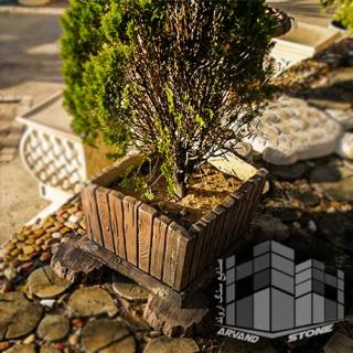 گلدان طرح چوب کوچک با پایه چرخ خوابیده